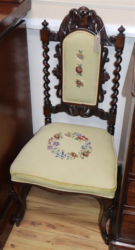 A Victorian tapestry seat and back hall chair